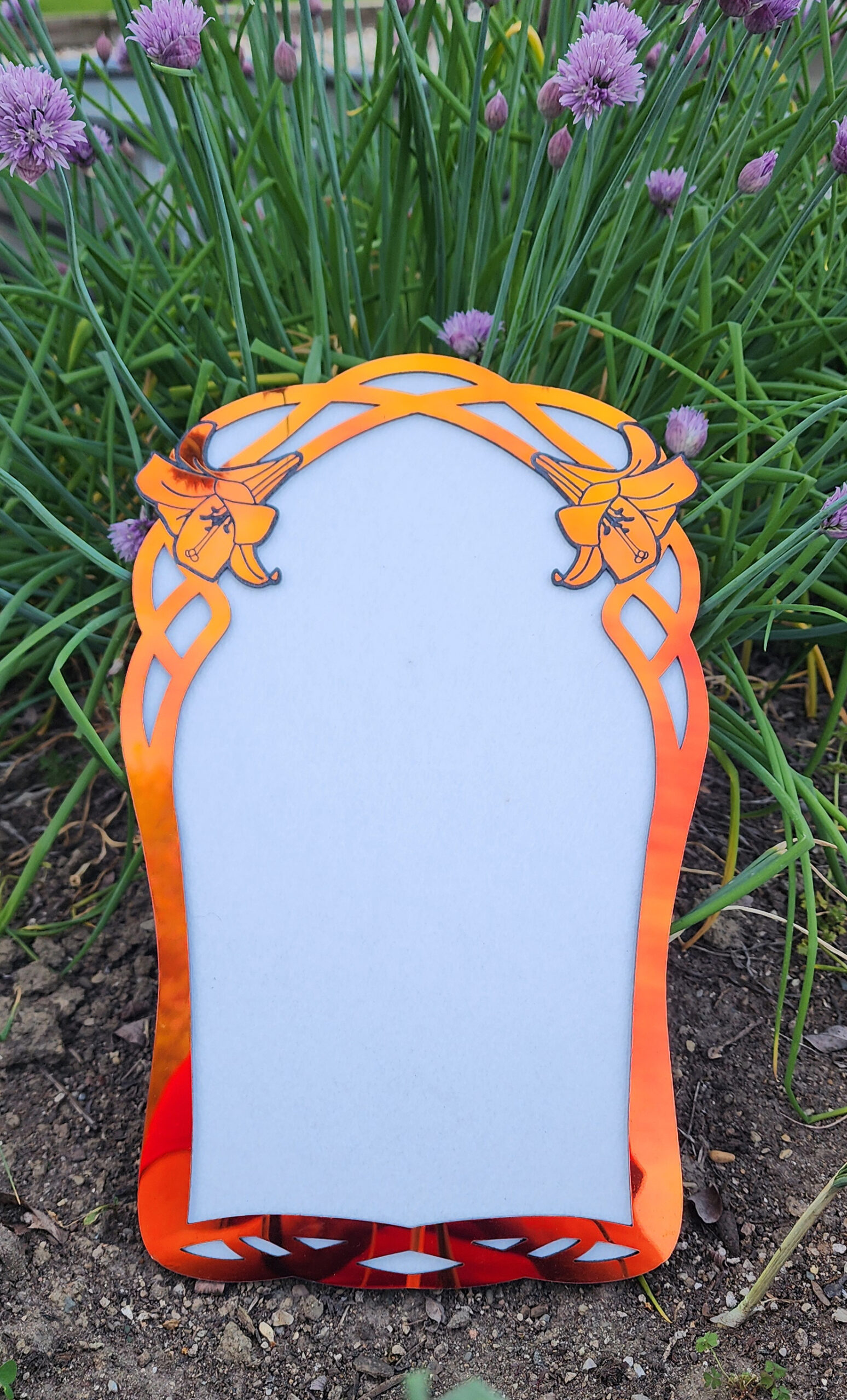An orange-green shifting, pointed, arch-shaped frame with a white center is placed against a rough, textured tree trunk with visible bark and knots.